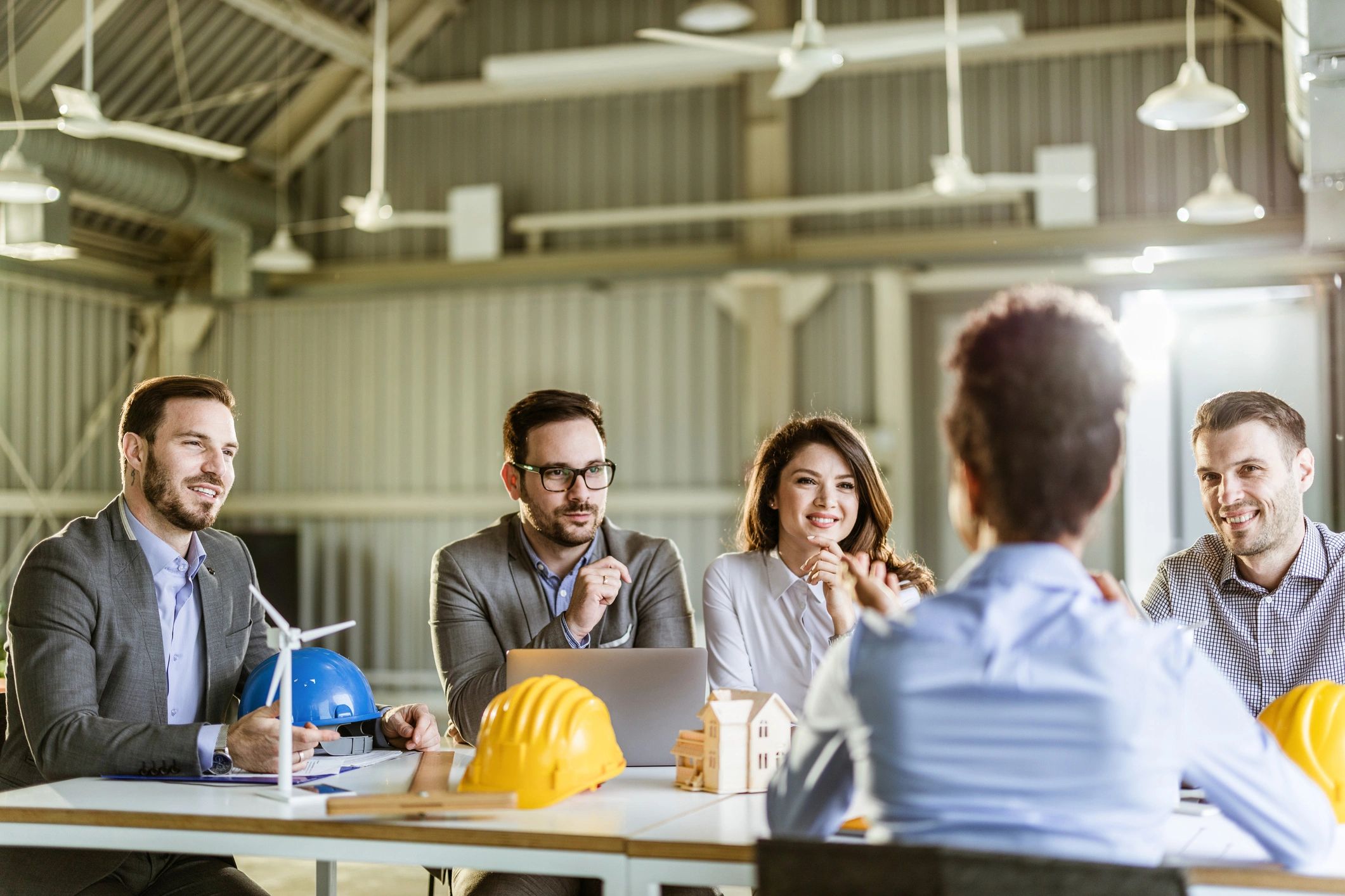 Professional team in an office meeting, representing client collaboration