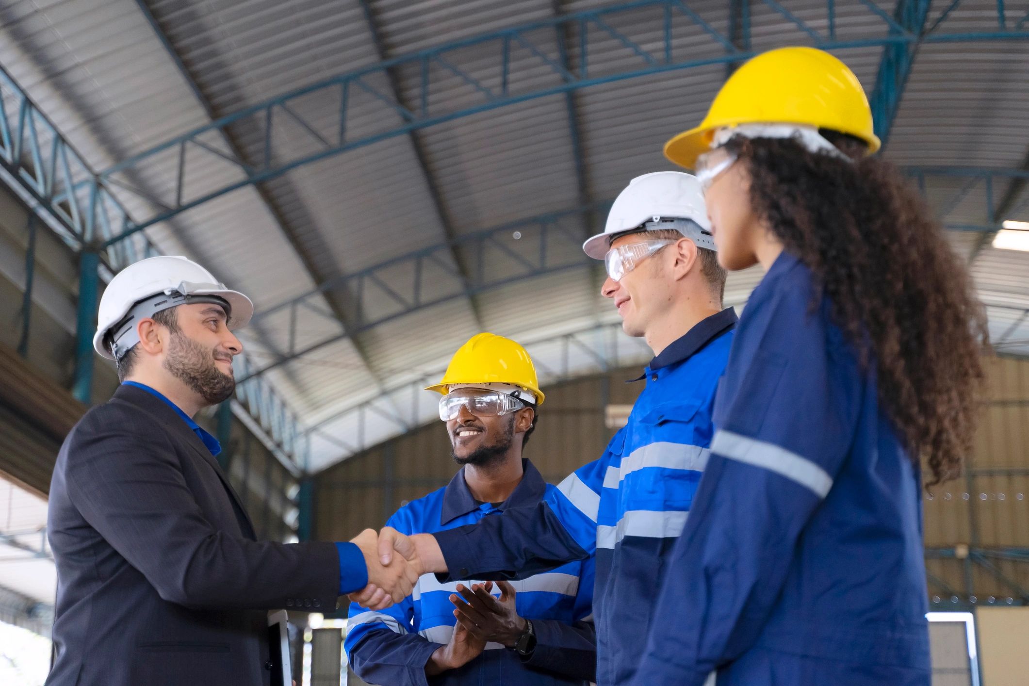 Team working in an industrial facility with automation