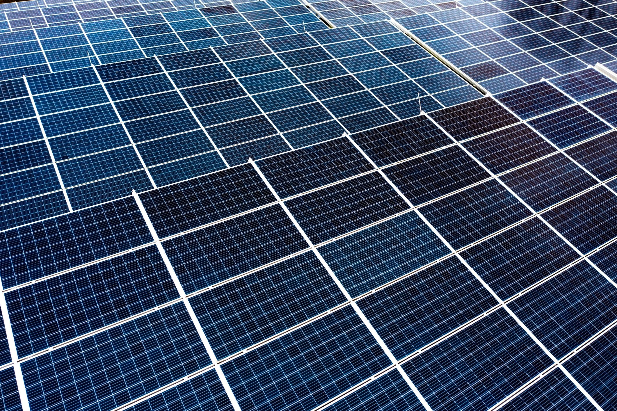 Aerial view of solar panels at scale