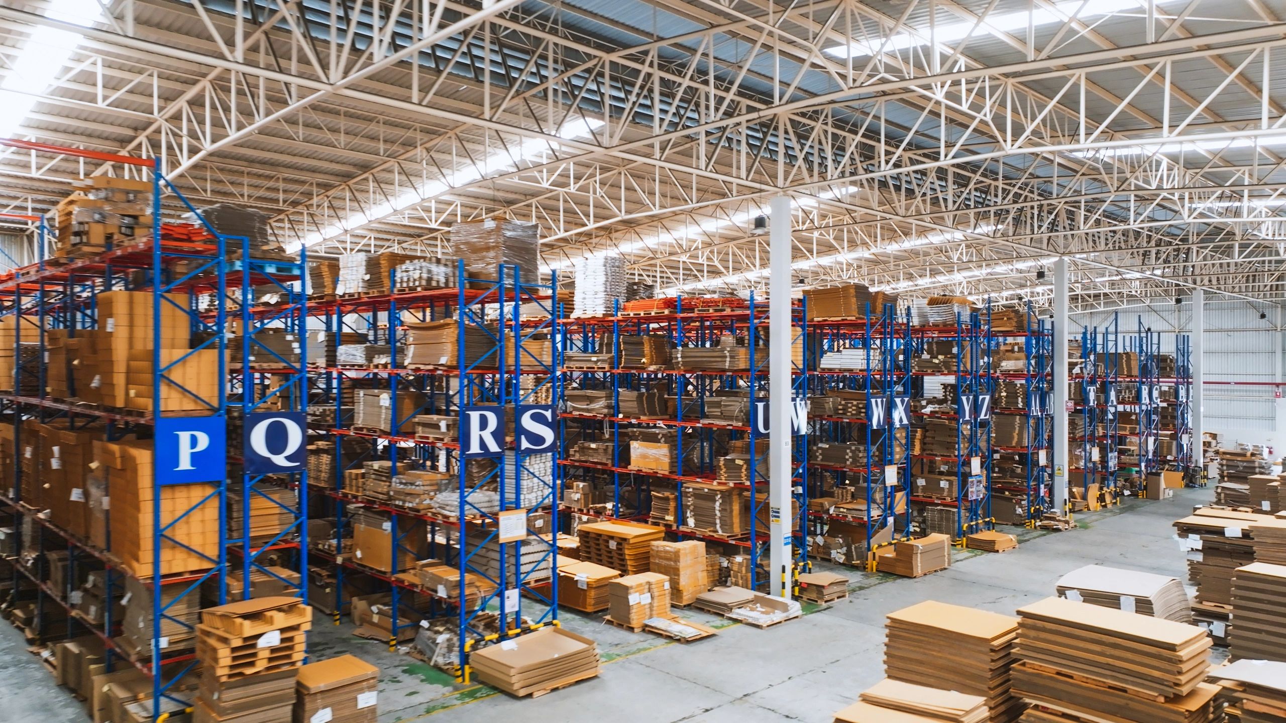 Industrial warehouse shelving representing organized supply and logistics