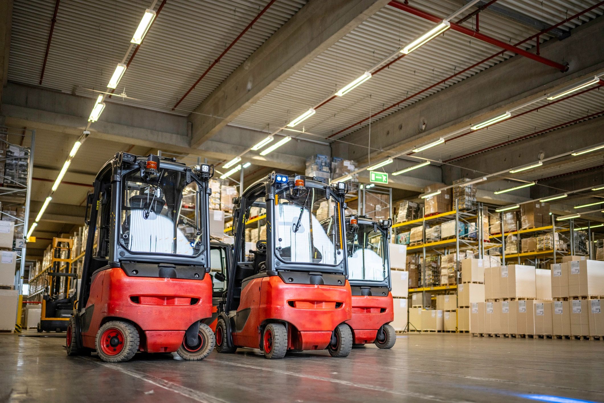 Forklifts in an empty warehouse